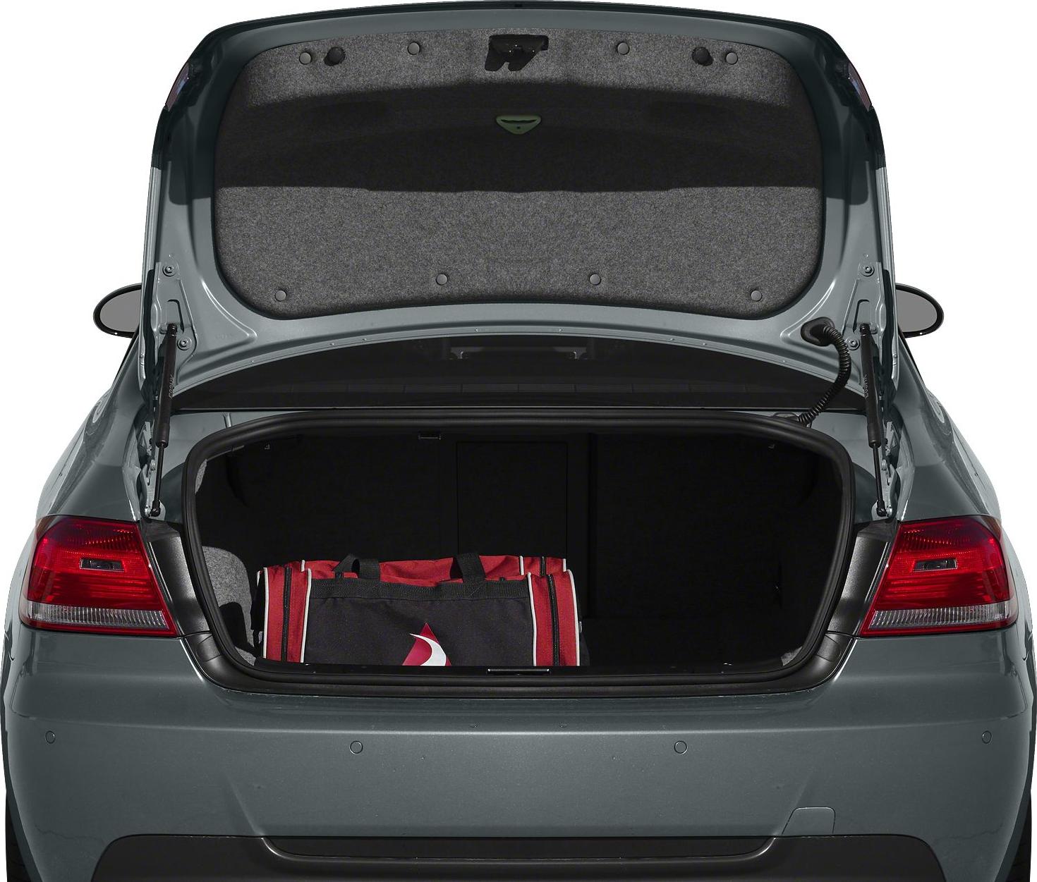 Open rear trunk with spacious cargo area and luggage