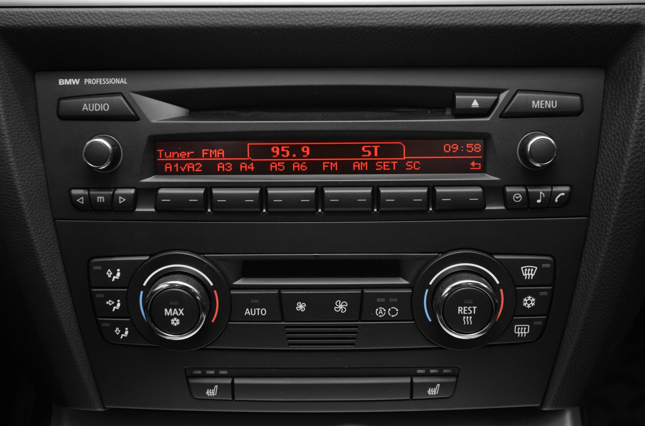 BMW radio and dual-zone climate control panel with digital display