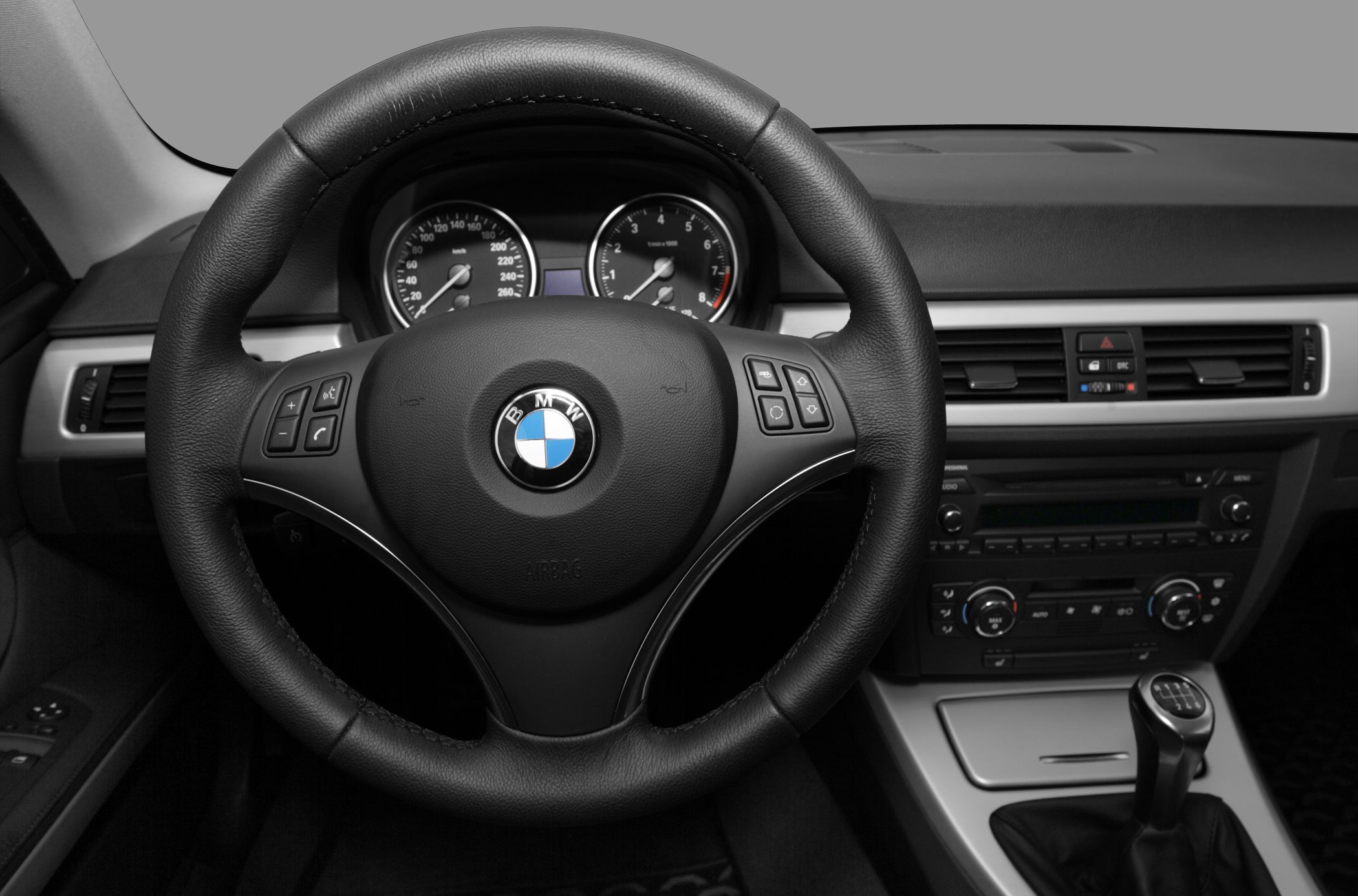 Leather steering wheel and dashboard interior with manual gear shift