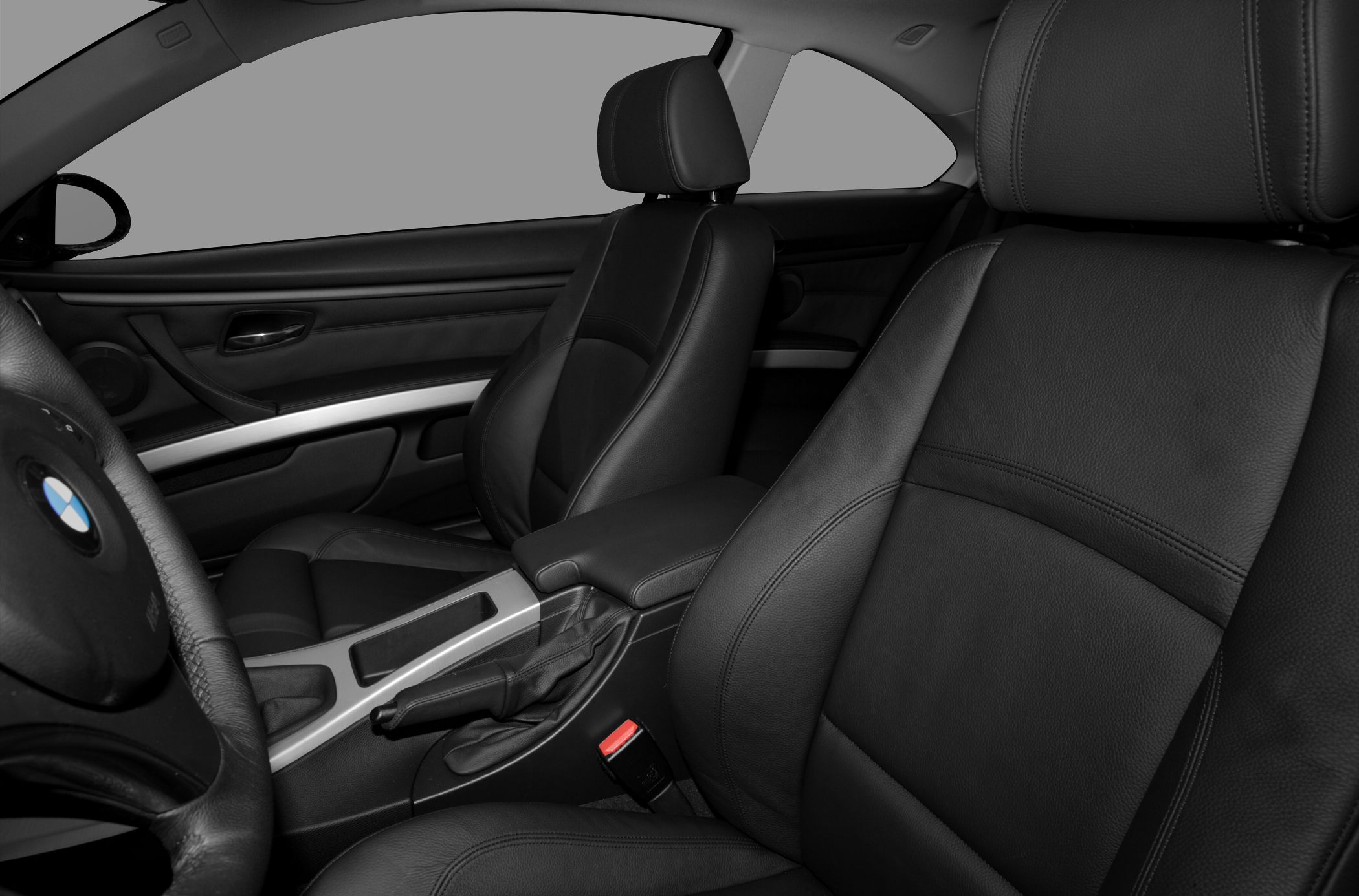 Black leather front seats with center console and handbrake