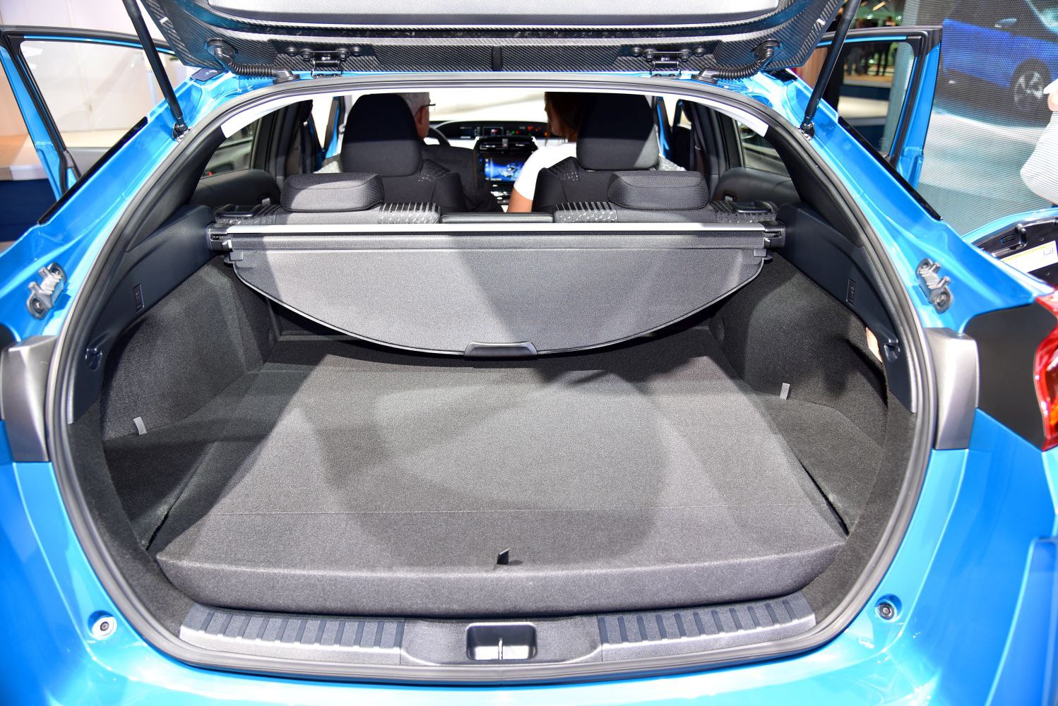 Spacious rear cargo area with retractable cover in hatchback