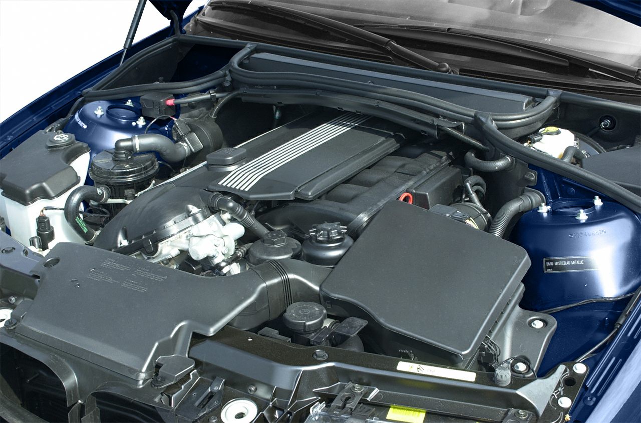 Inline-six engine and components in engine bay
