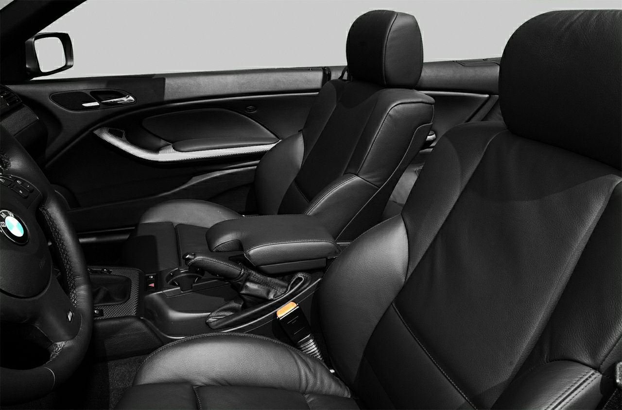 Black leather seats and detailed driver cockpit of luxury convertible