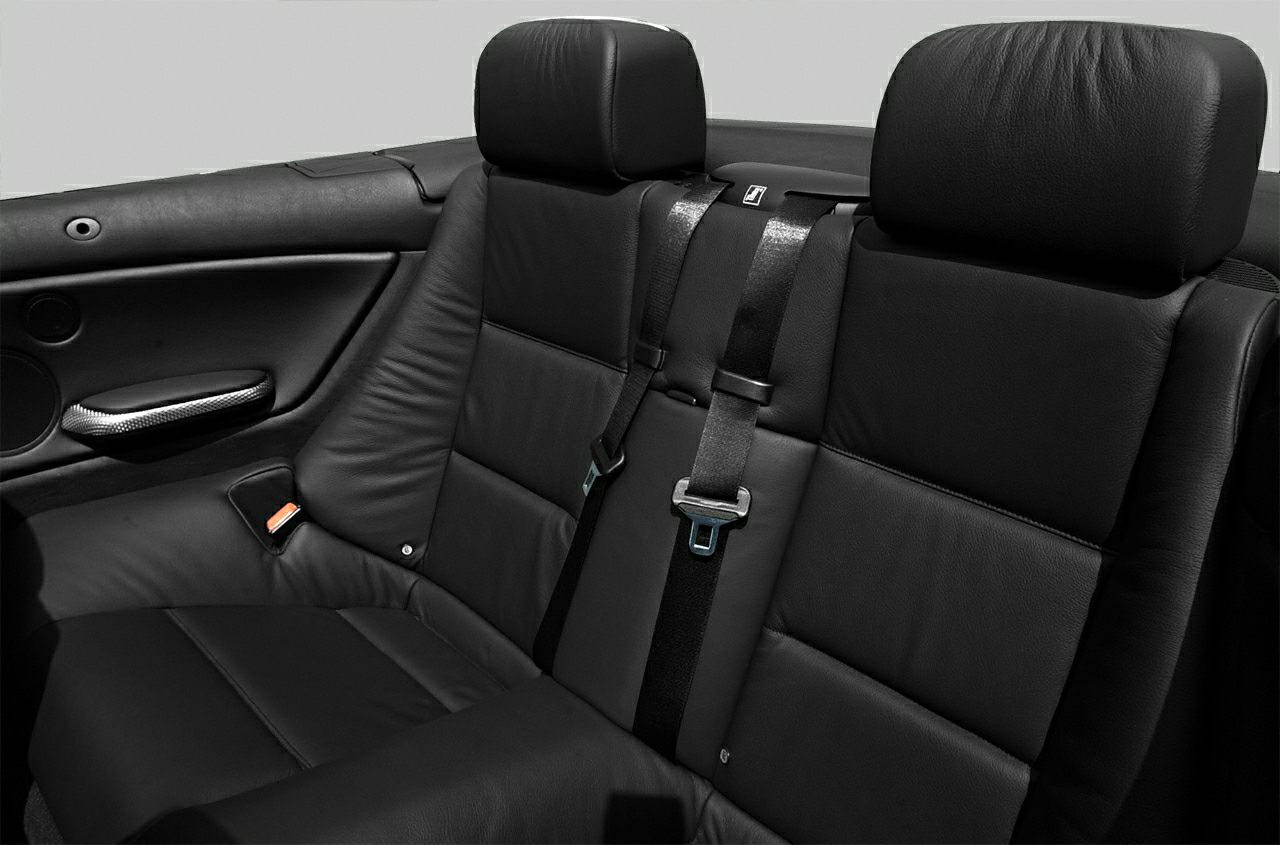 Black leather rear seats with seat belts and headrests