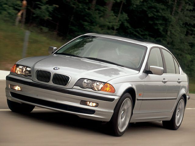 Silver sedan front view with kidney grille and clear headlights