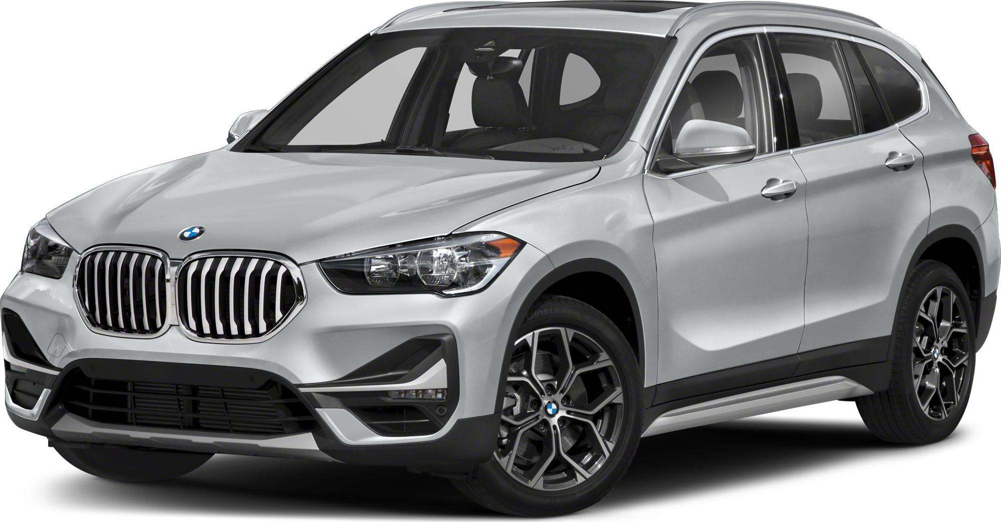 Front-side view of silver SUV with kidney grille and alloy wheels.