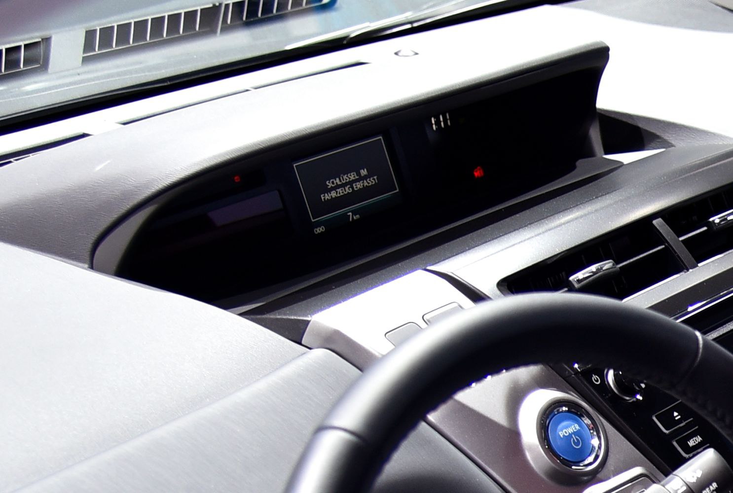 Digital dashboard display and power start button with air vents