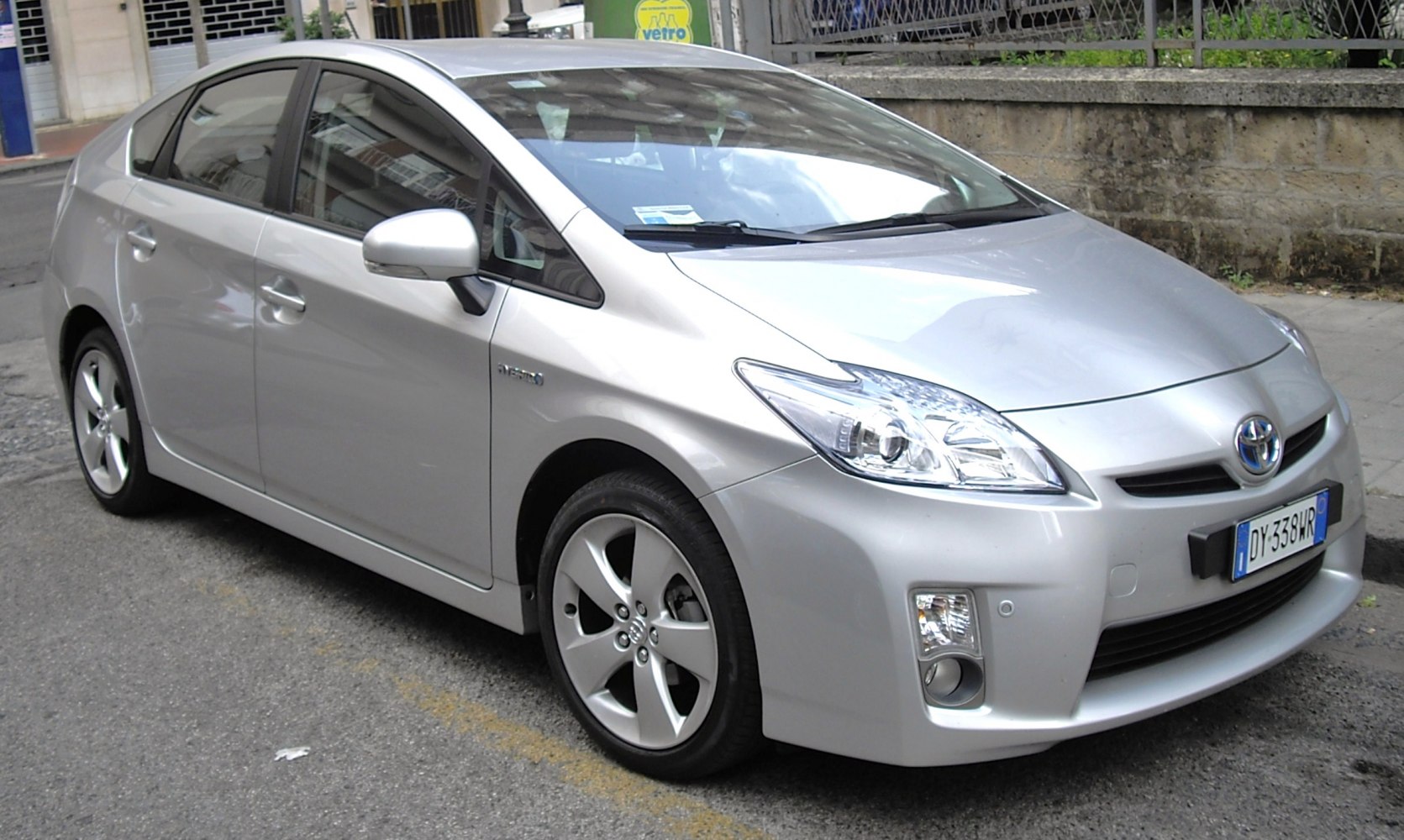 Silver compact hybrid hatchback with alloy wheels front-side view