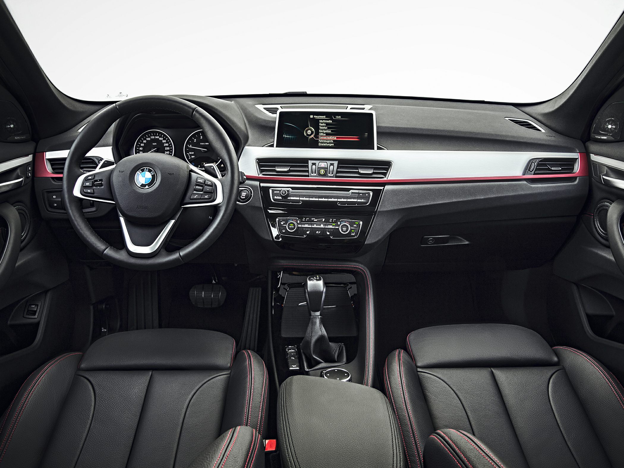 Dashboard, steering wheel, infotainment system with dual-zone climate control