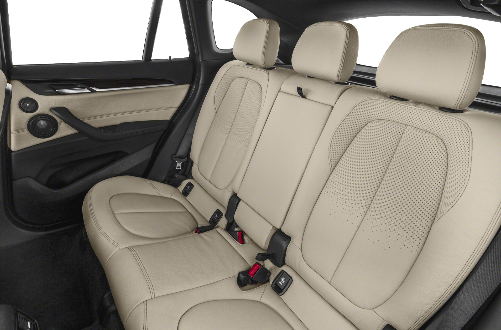 Beige leather rear seats with detailed stitching and integrated headrests