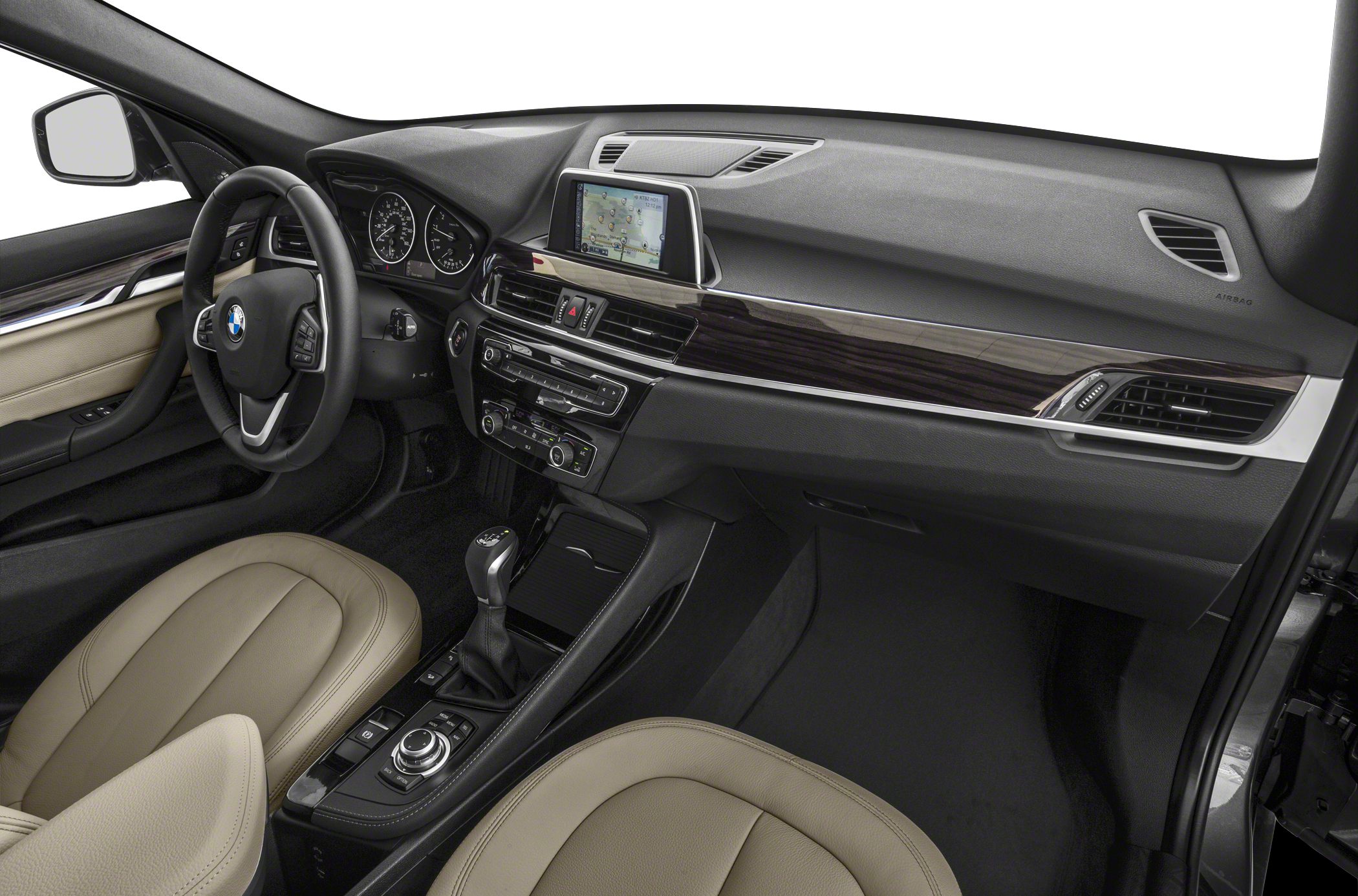 Dashboard with touchscreen, center console, beige leather seats, steering wheel