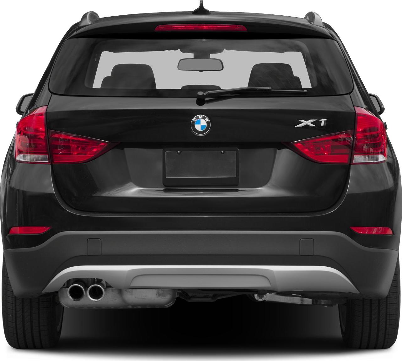 Rear view with signature taillights and dual exhaust pipes