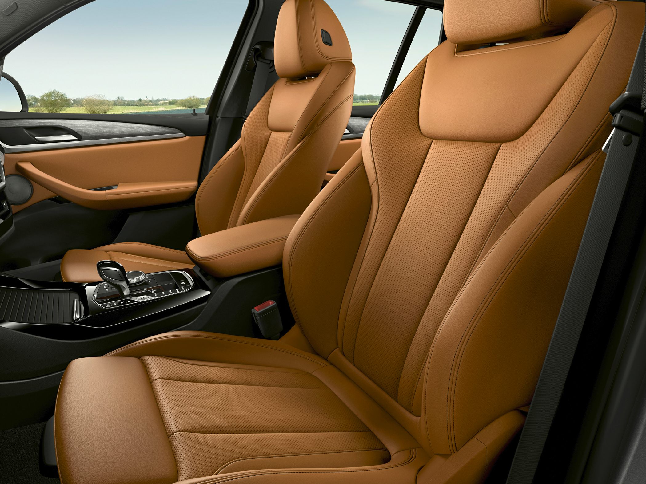 Luxurious tan leather front seats with advanced center console.