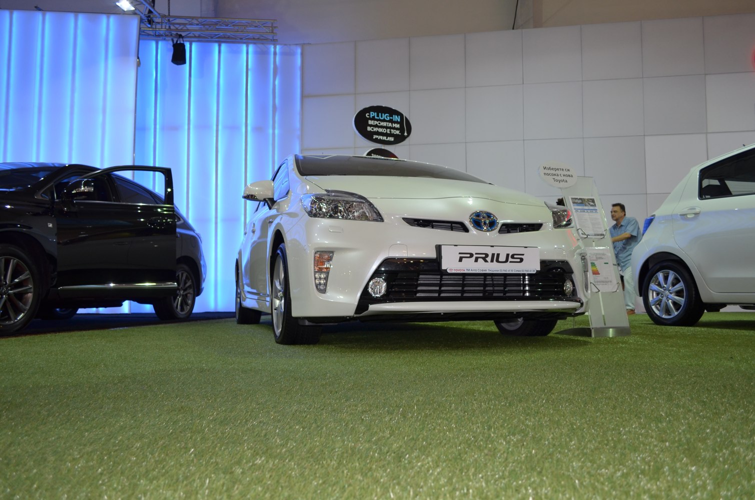 Front view of hybrid hatchback with LED headlights.