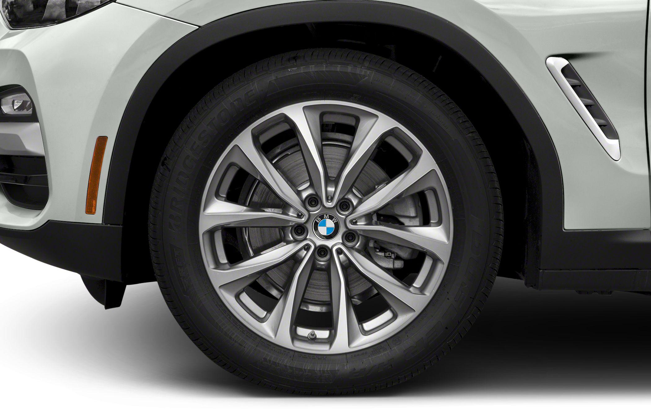 Multi-spoke alloy wheel and Bridgestone tire close-up