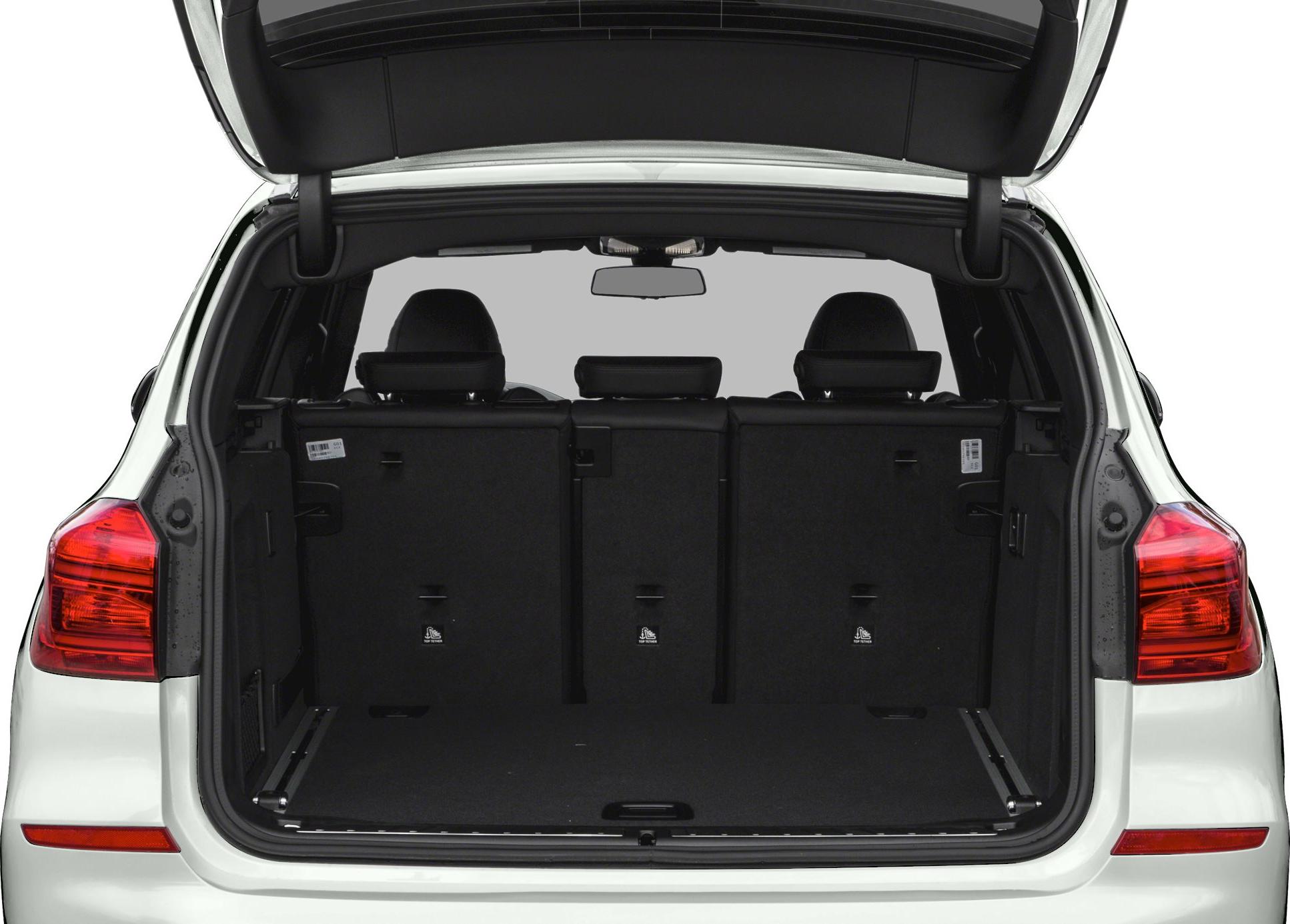 Spacious rear cargo area with open trunk and visible rear seats