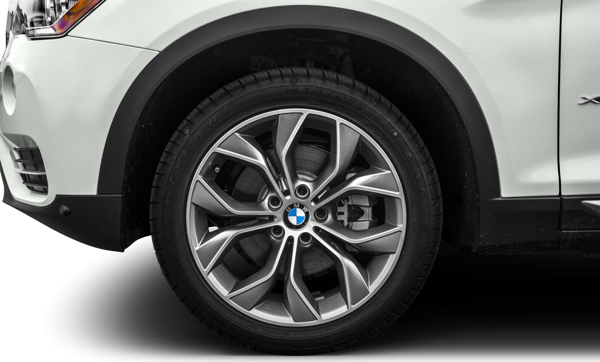Close-up of alloy wheel and tire with brake disc