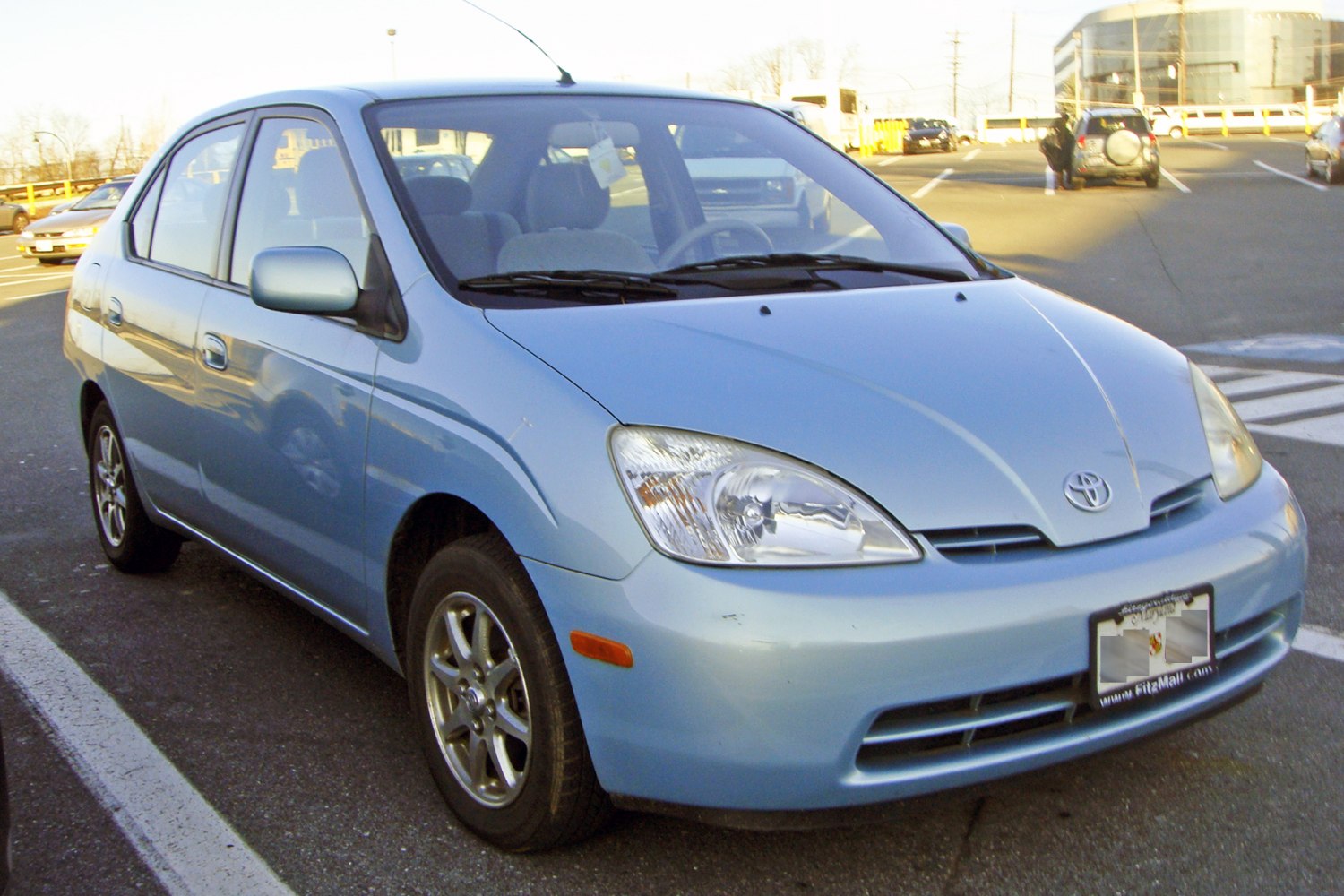 Front view with alloy wheels of an early hybrid sedan