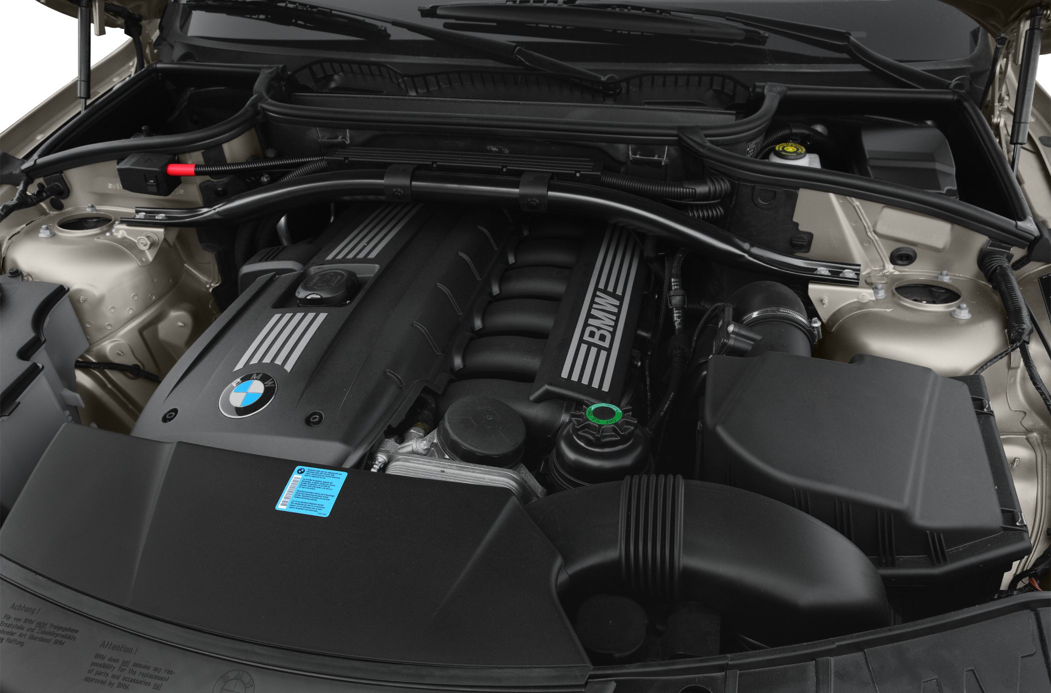 Close-up of BMW engine bay with detailed components and structure