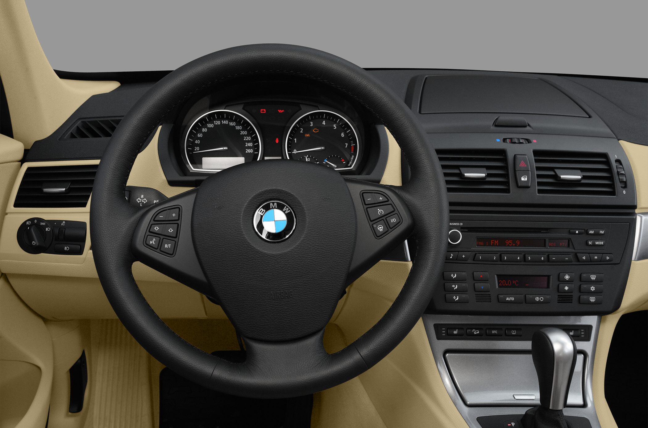 BMW steering wheel with instrument cluster and central dashboard controls
