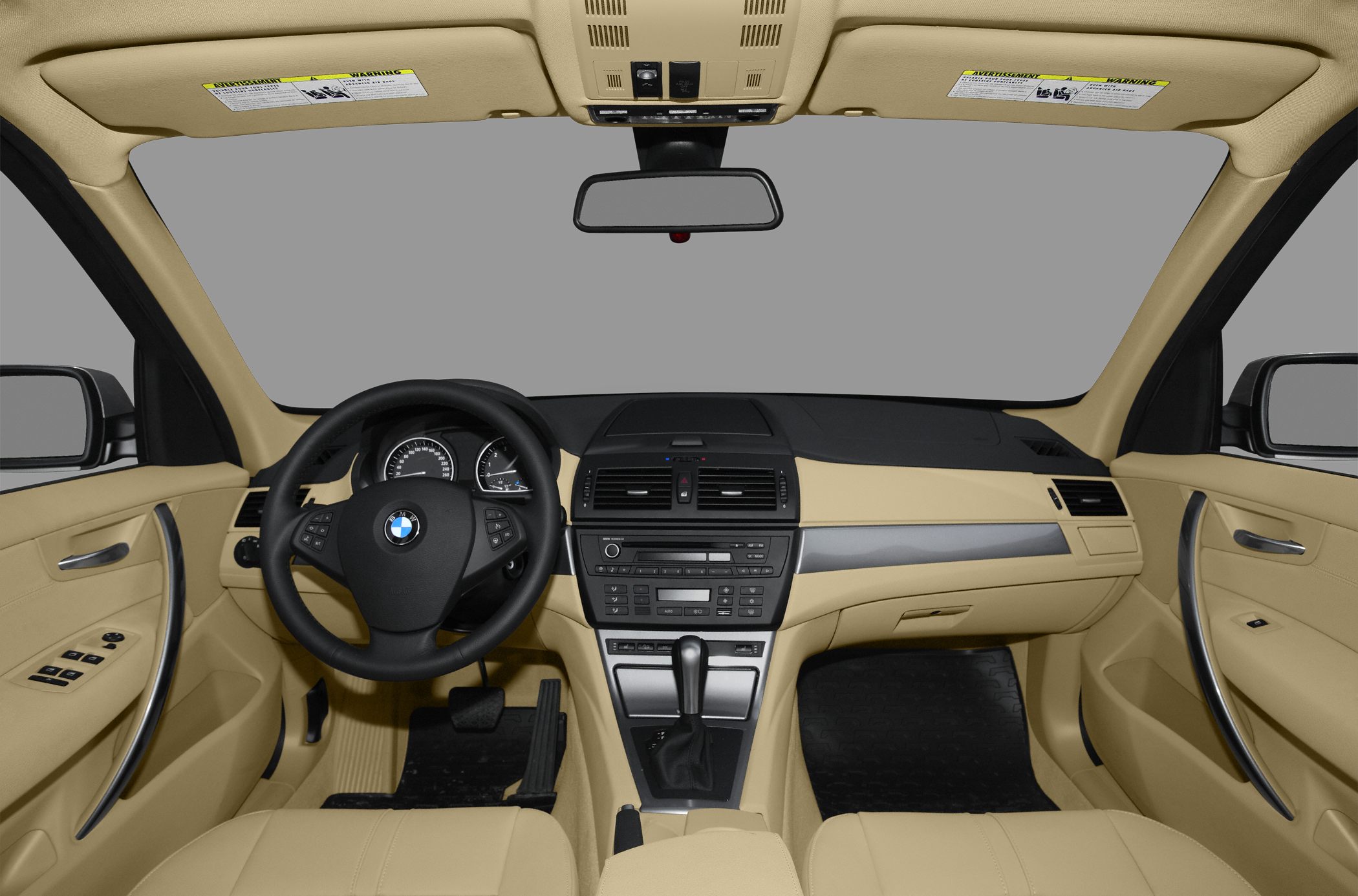 Beige dashboard and steering wheel with control buttons