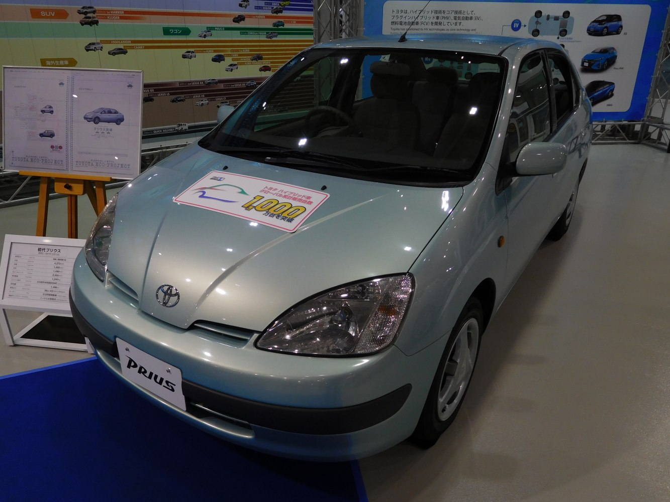 Front hood, headlight, windshield, and interior seats of a compact hybrid hatchback