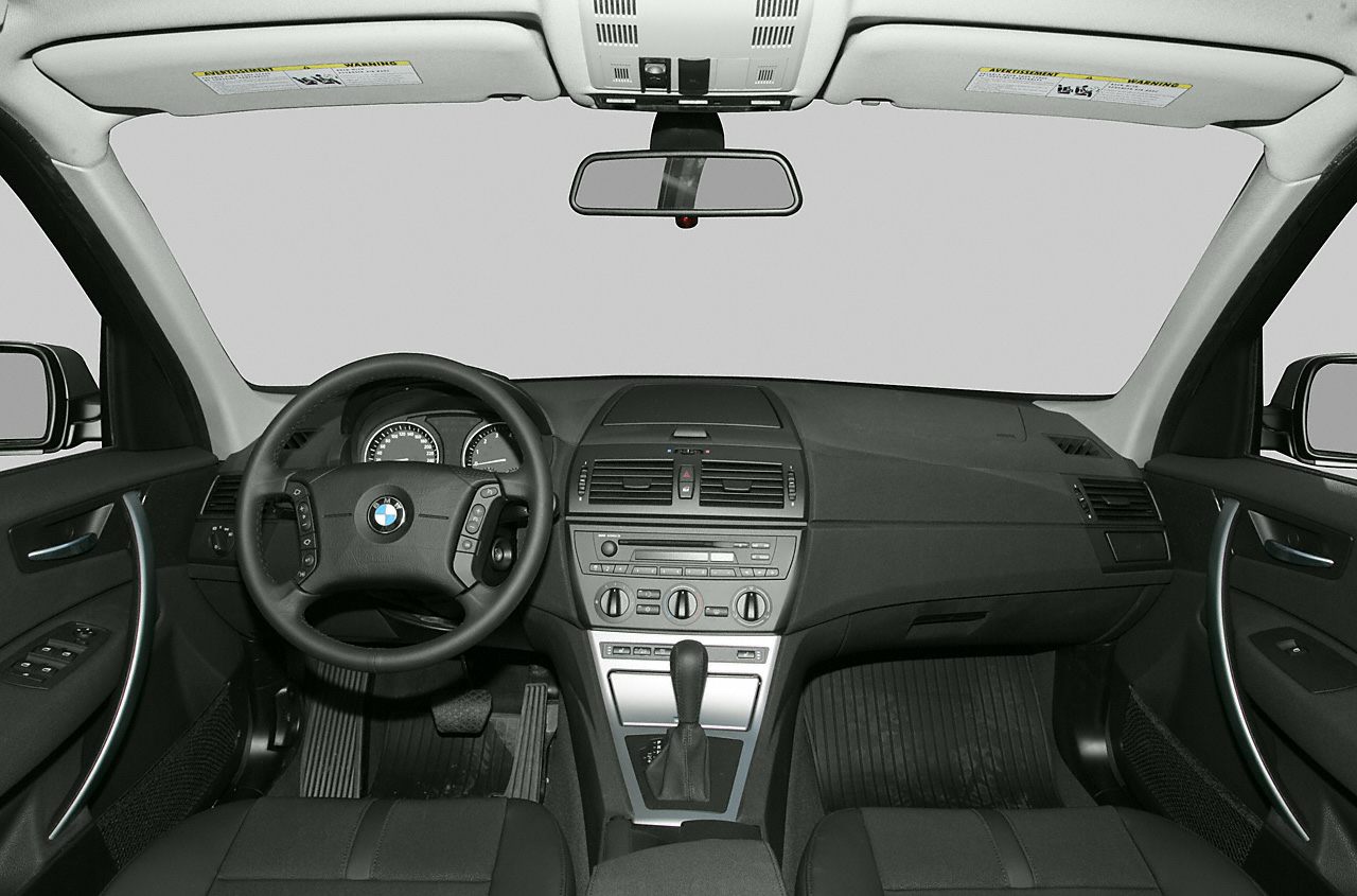 Dashboard and steering wheel with center console and gear shifter