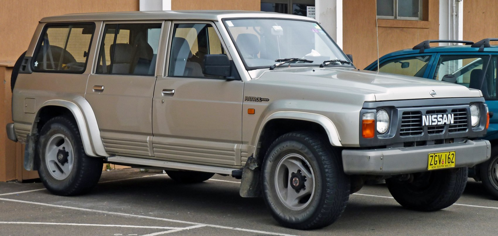 Boxy off-road SUV with prominent wheel arches and robust tires.