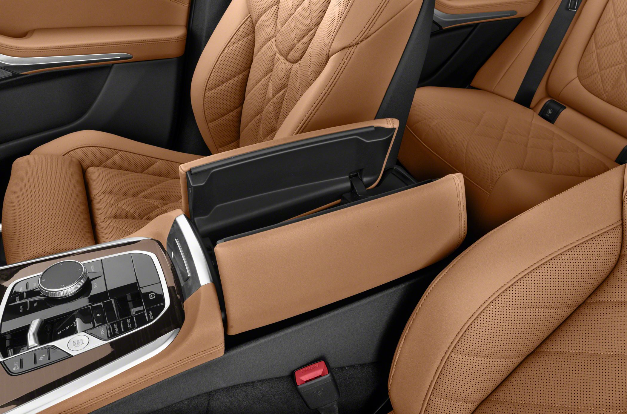 Brown leather seats and center console with control dial