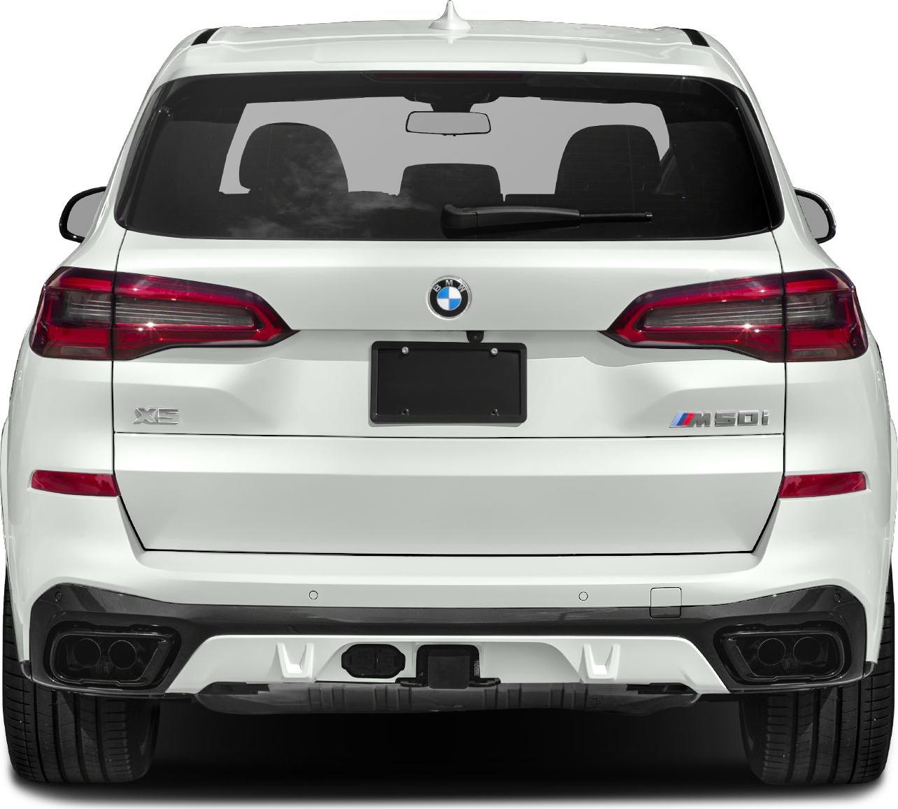 Rear view with distinctive taillights and dual exhausts
