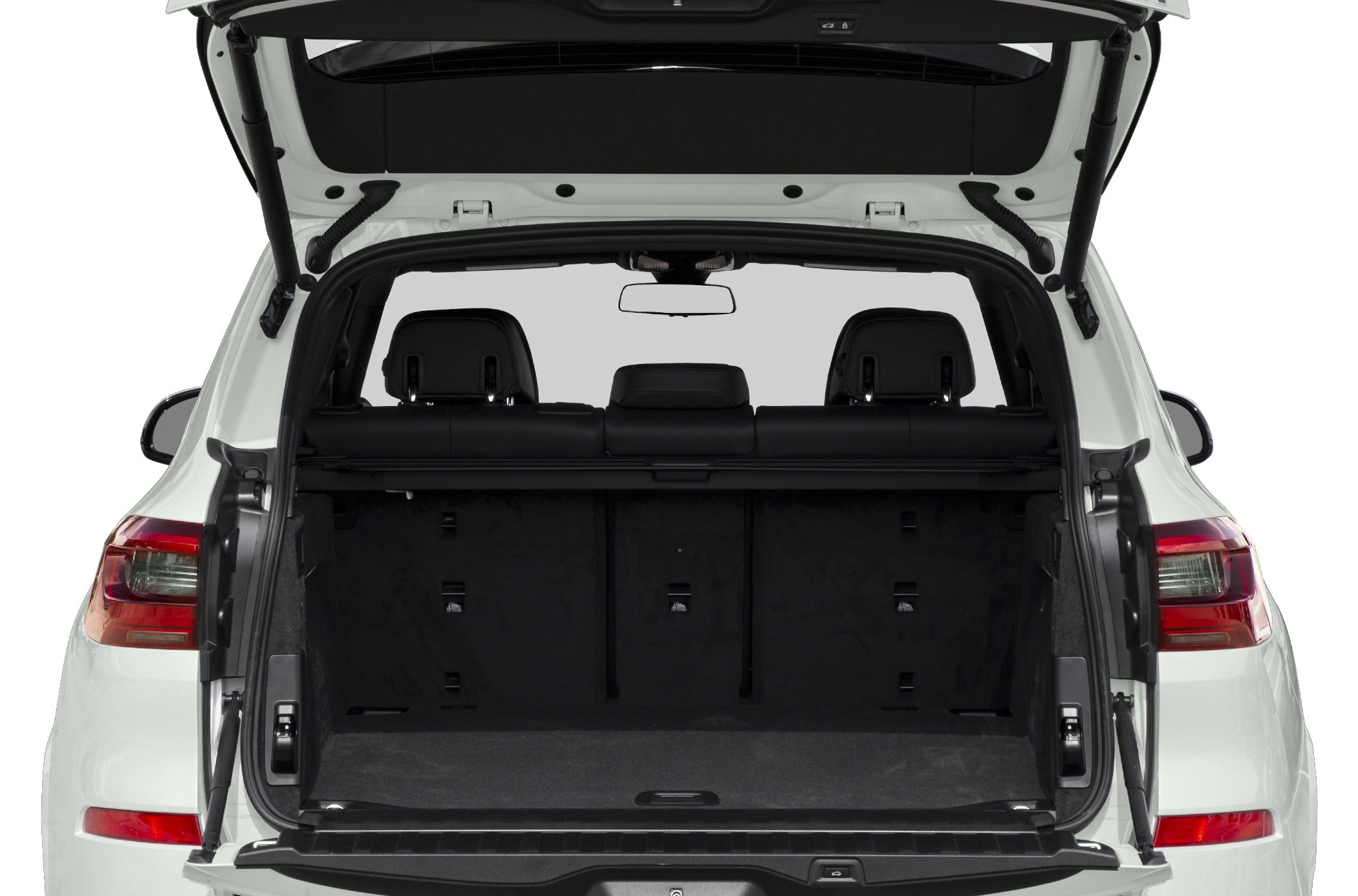 Open rear cargo area with seats and hatch open