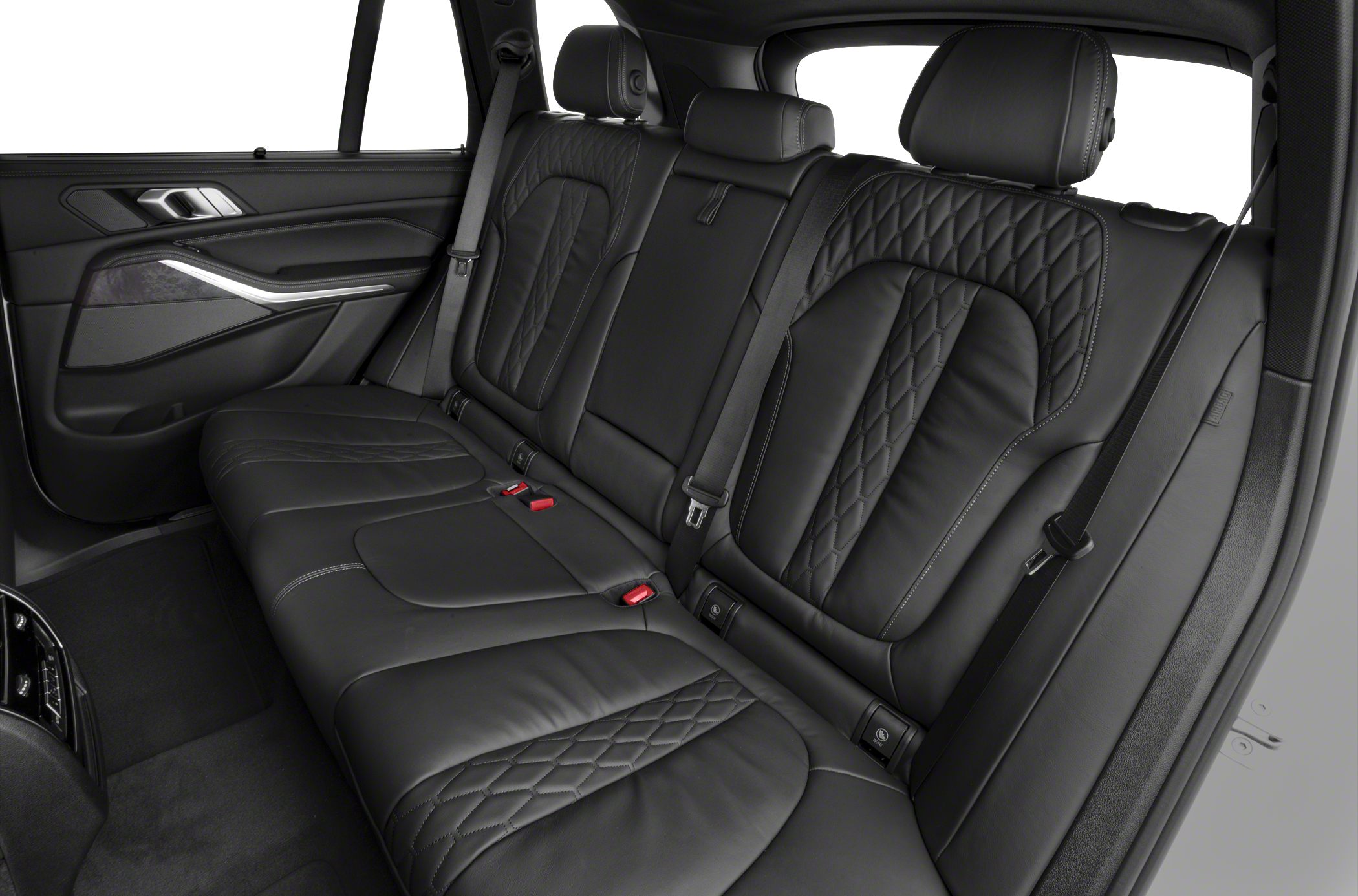 Luxurious rear leather seats with detailed stitching and spacious layout