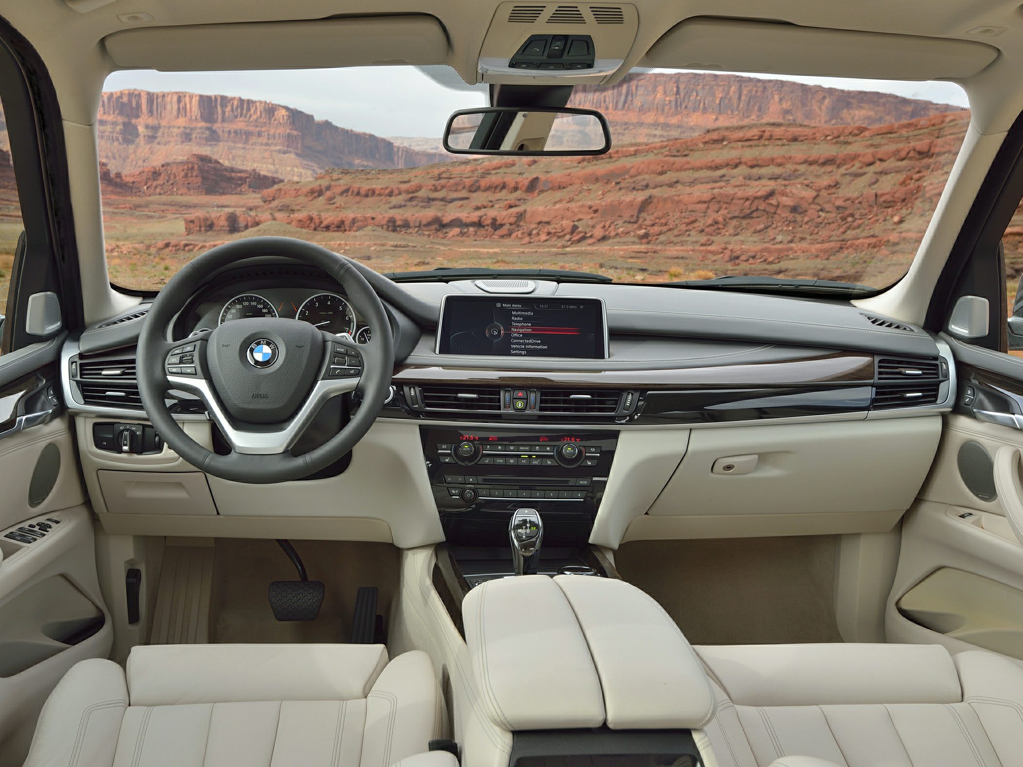 Luxury dashboard and steering wheel with infotainment display