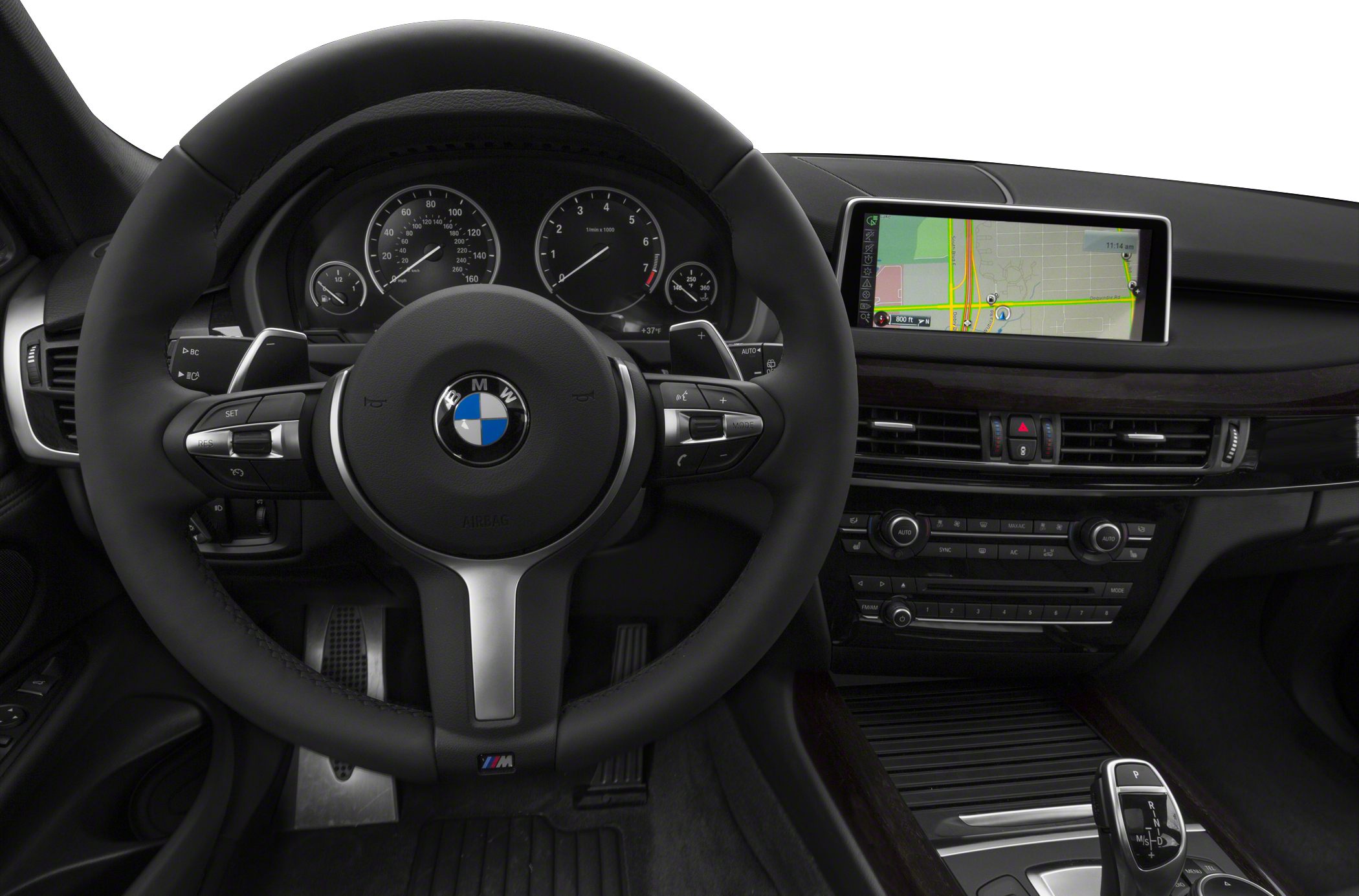Steering wheel, instrument cluster, and navigation display in luxury SUV interior