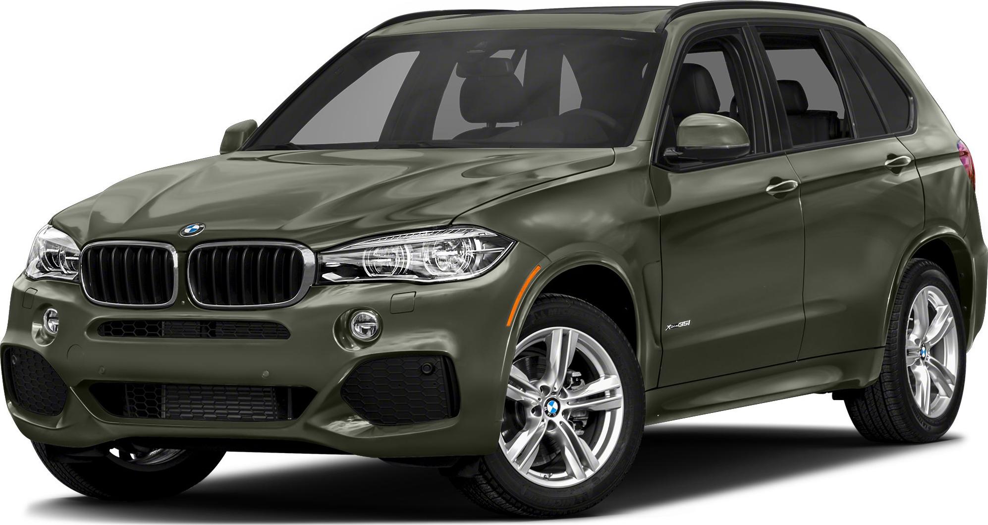 Front view of SUV with prominent headlights and alloy wheels