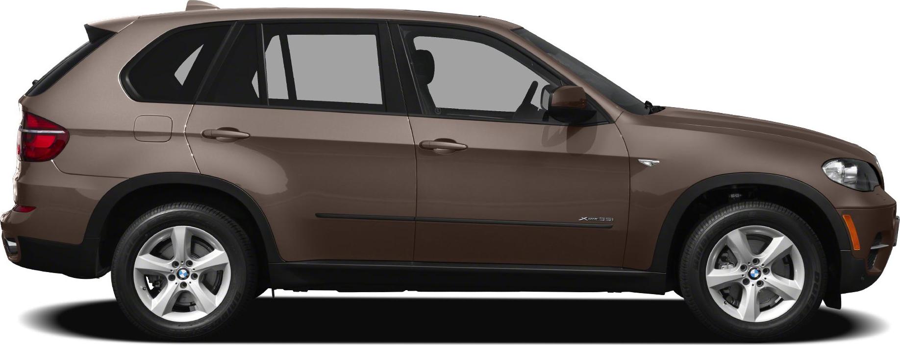 Side profile view of an SUV with alloy wheels and door handles