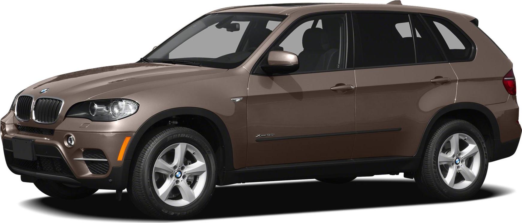 Facelifted SUV with updated grille, headlights, and five-spoke wheels