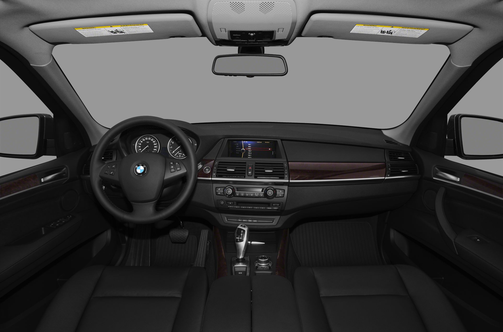 Luxury SUV interior dashboard with steering wheel and infotainment screen