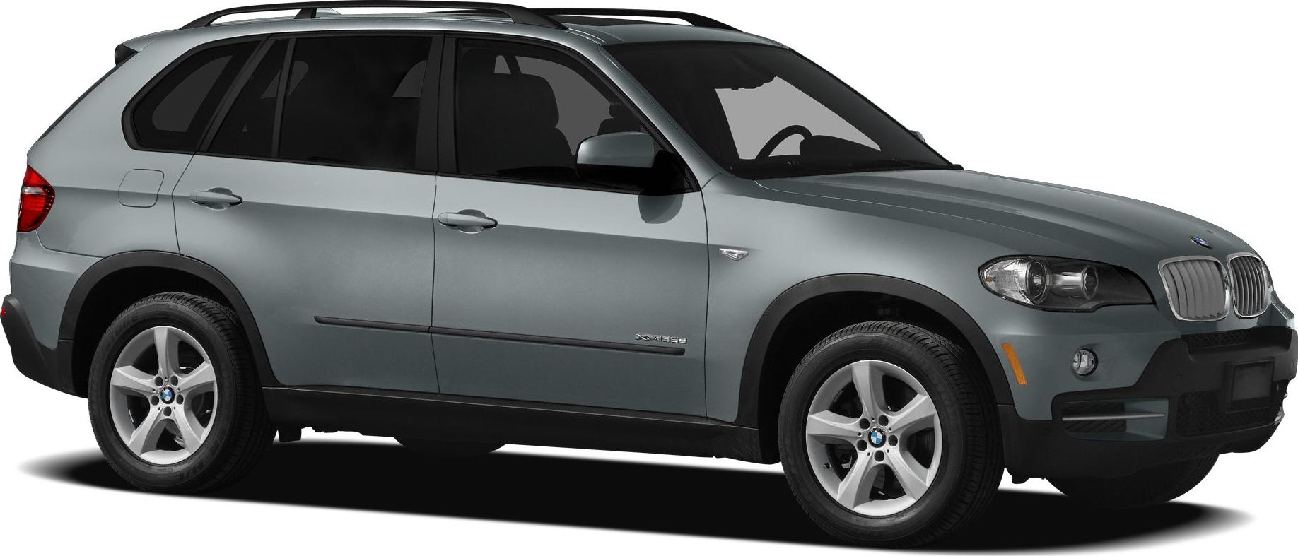 Side profile of a silver SUV with alloy wheels and roof rails