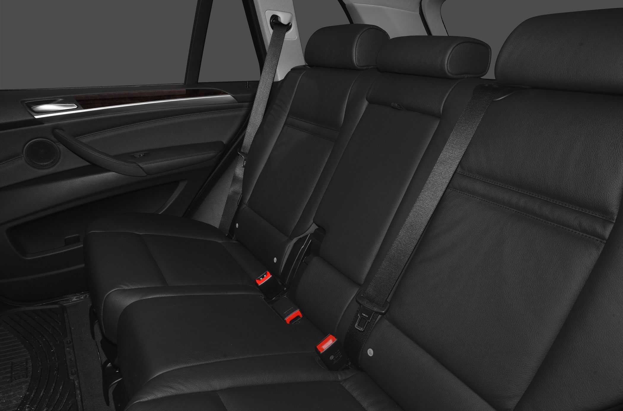 Rear leather seats with seat belts inside a car