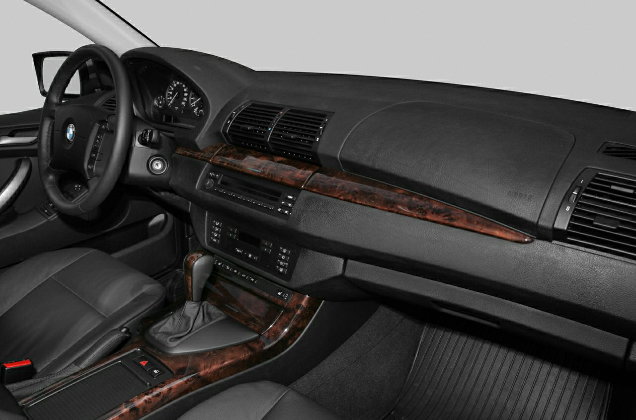 Interior dashboard with wood trim and automatic gear shift
