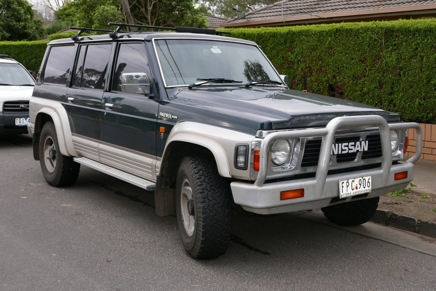 Off-road SUV with bull bar and roof rack