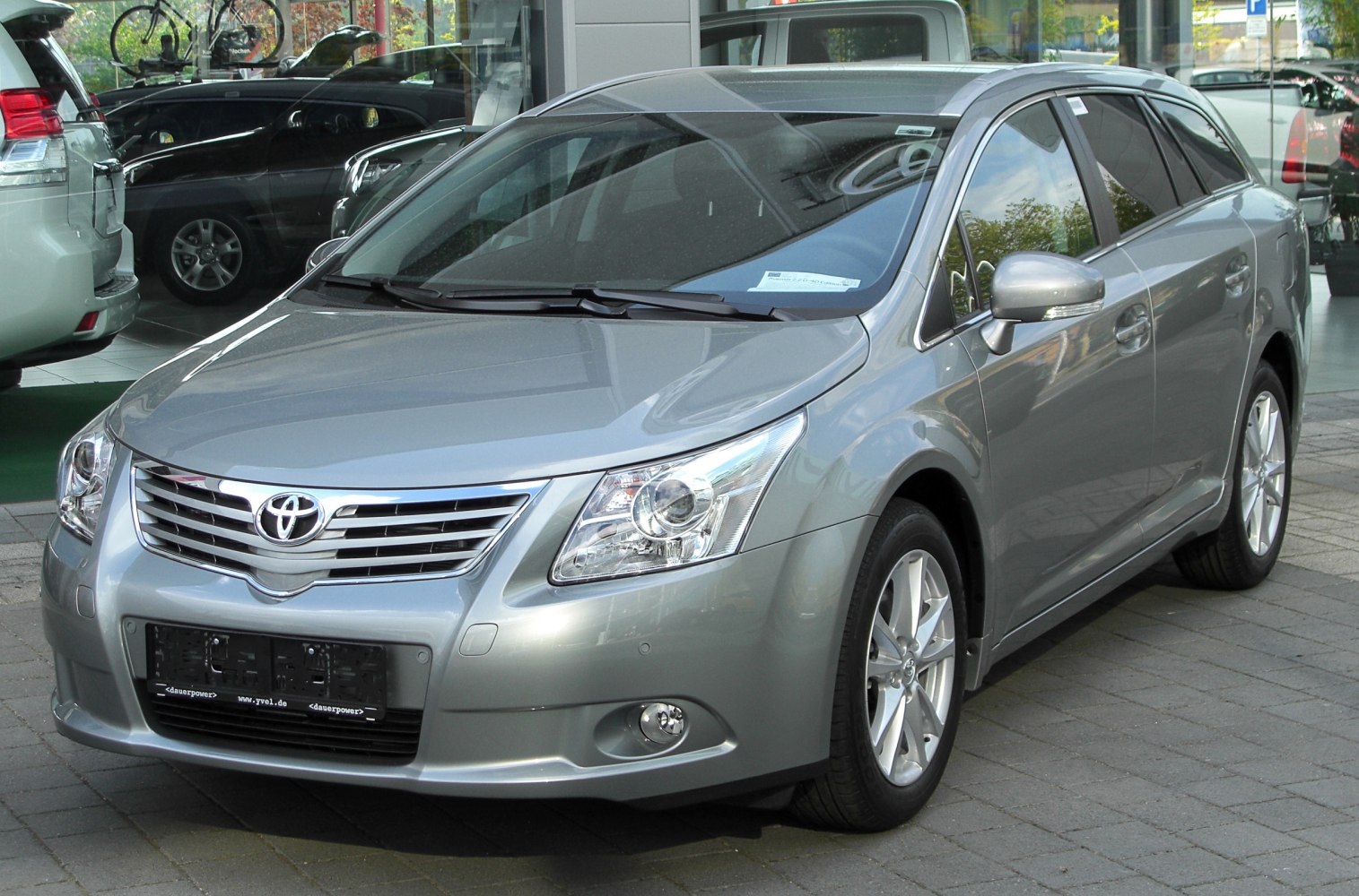 Silver wagon with detailed front grille and headlights