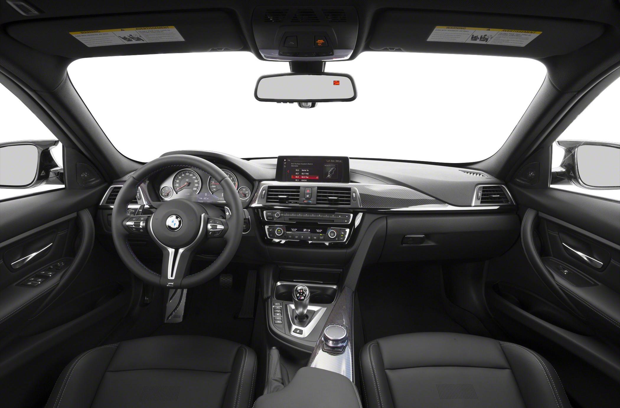 Interior view with dashboard, steering wheel, and center console