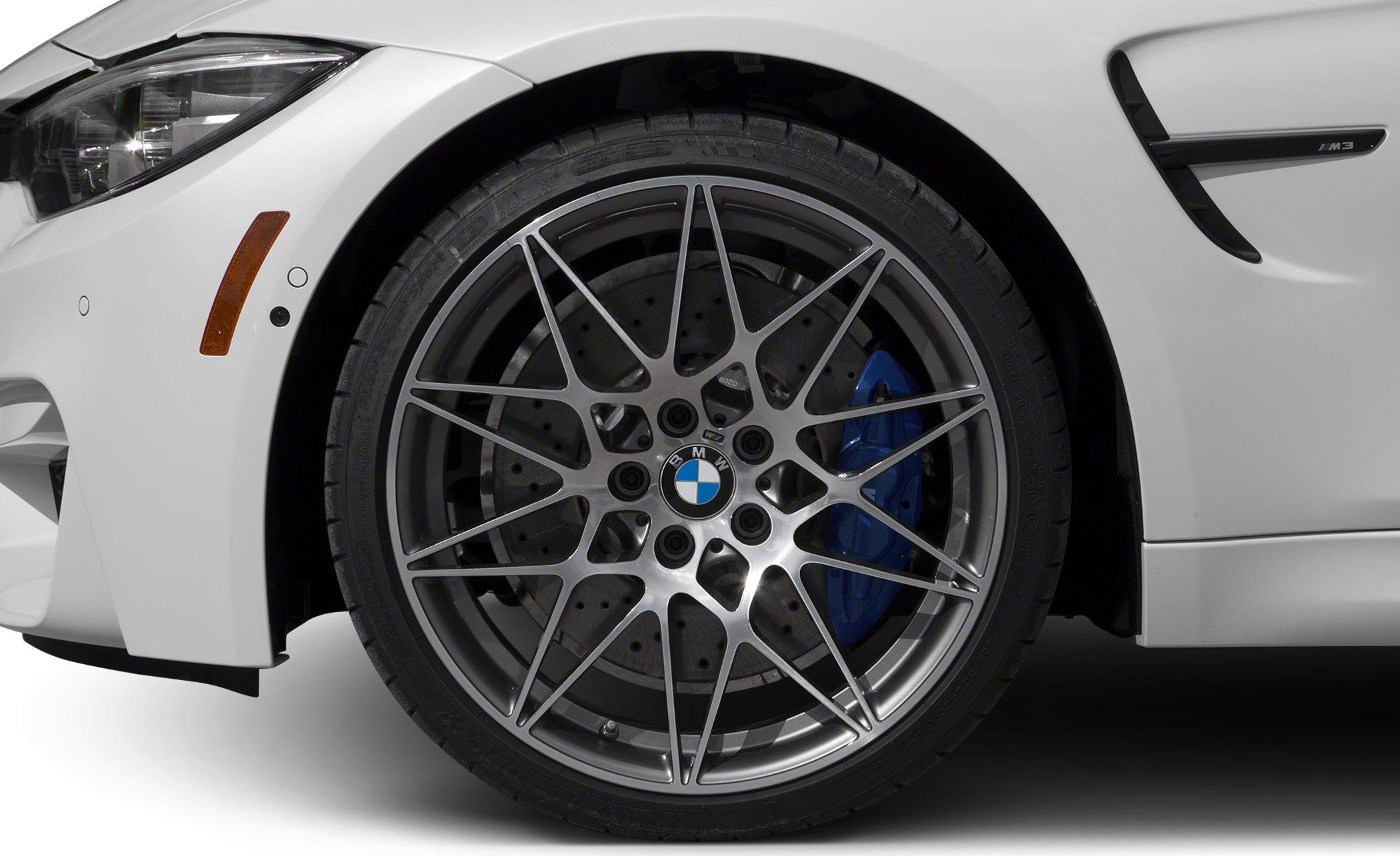 Multi-spoke alloy wheel with blue performance brake caliper