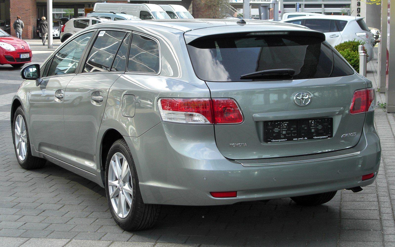 Rear side view with taillights and alloy wheels