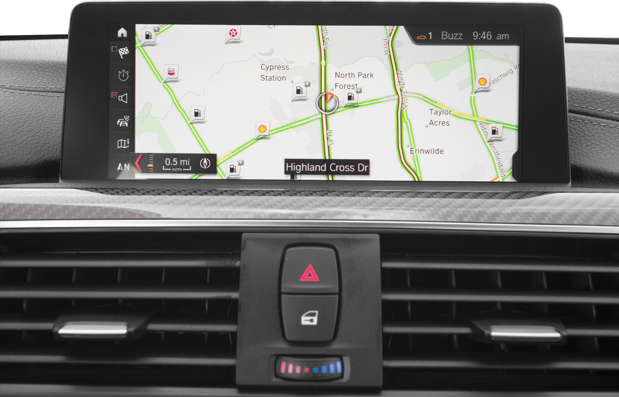 Car dashboard with navigation screen and control buttons