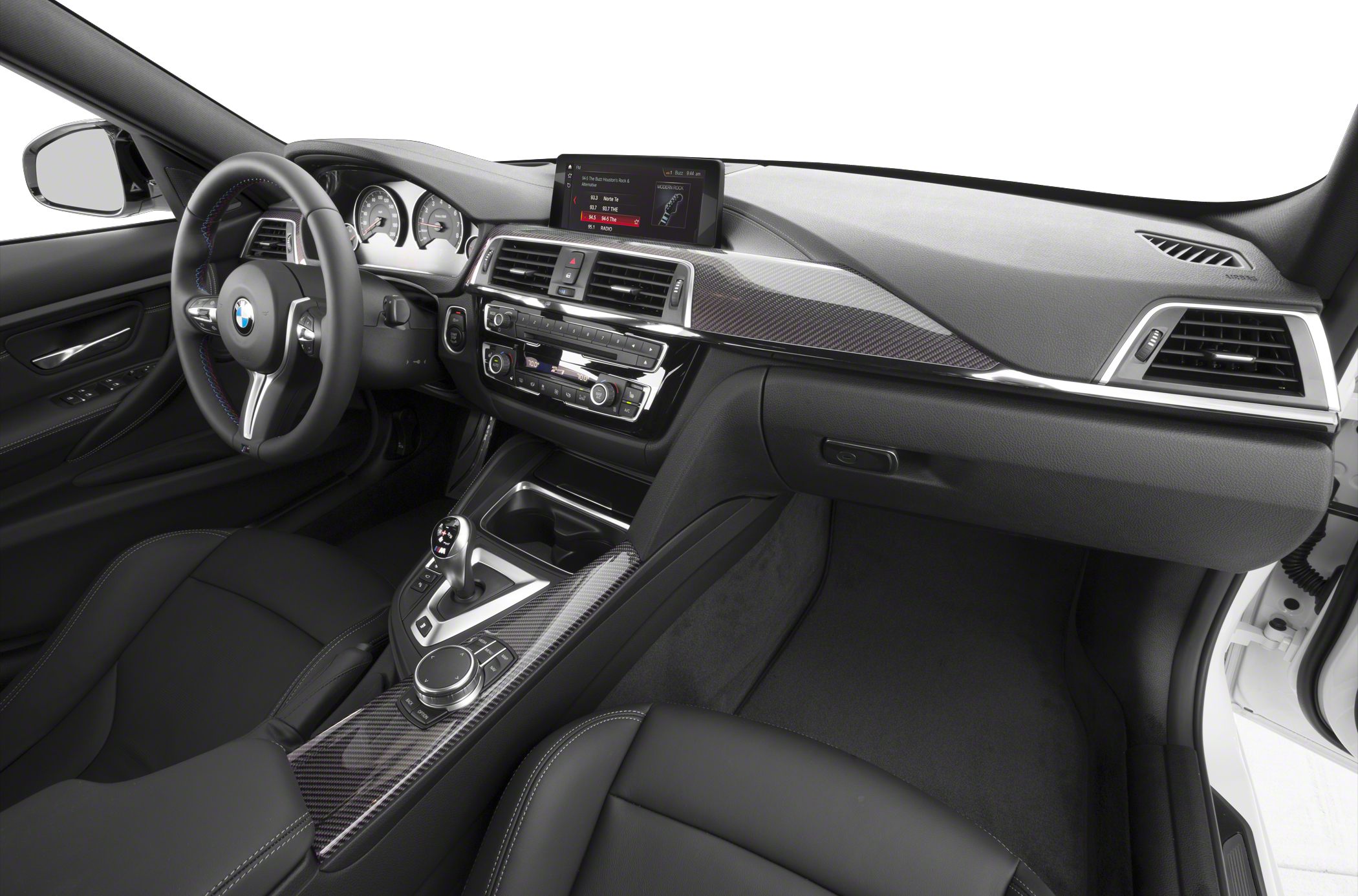 Dashboard and steering wheel with carbon fiber trim and multimedia display