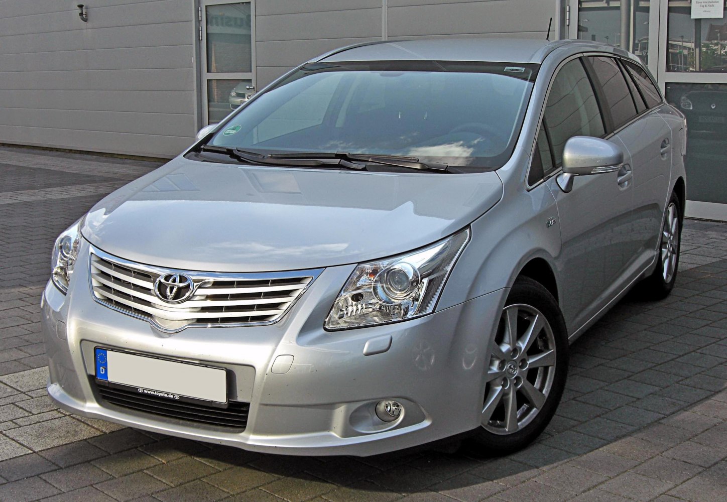 Front view with chrome grille and angular headlights