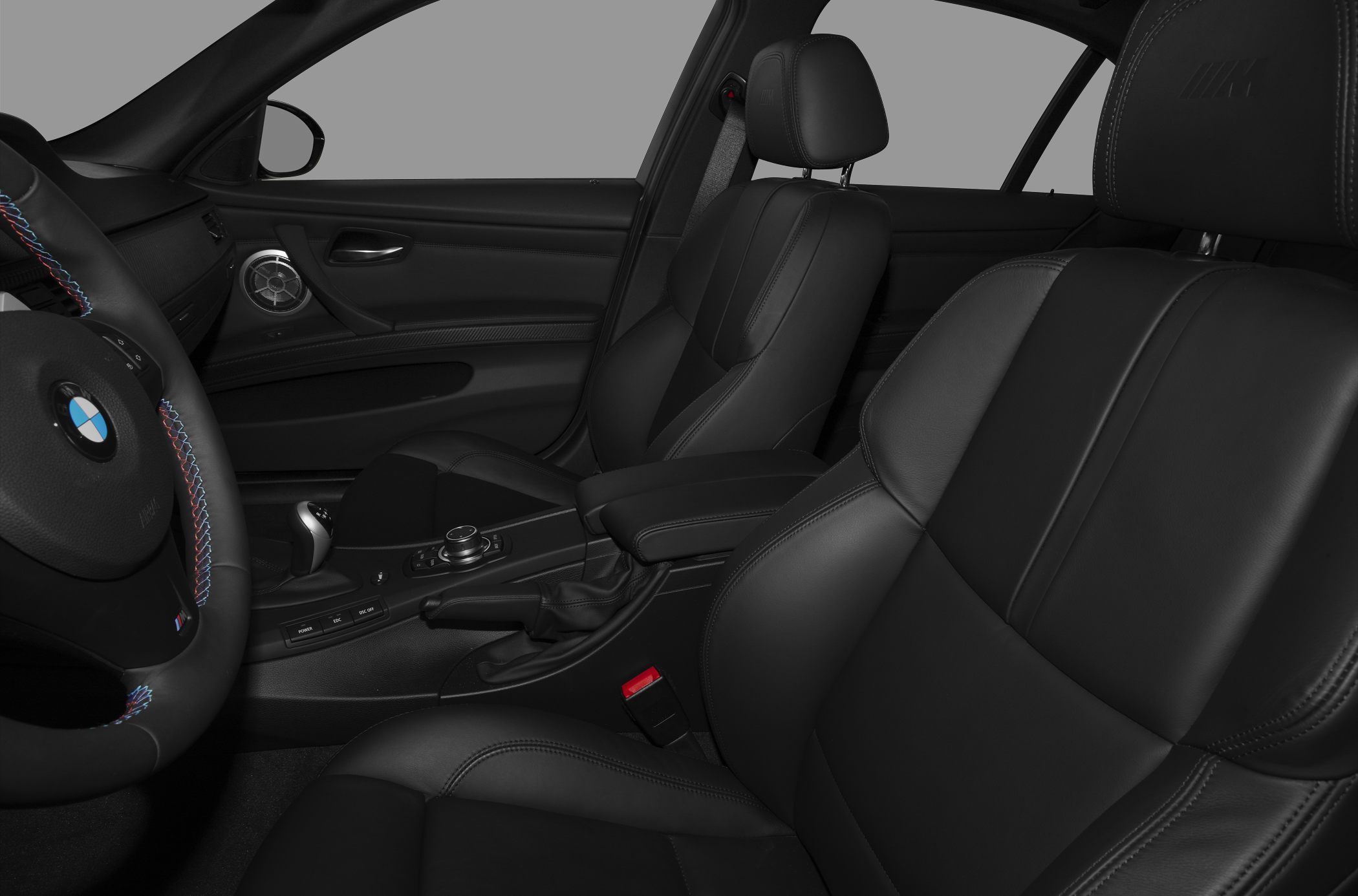 Black leather sport seats and steering wheel with detailed stitching